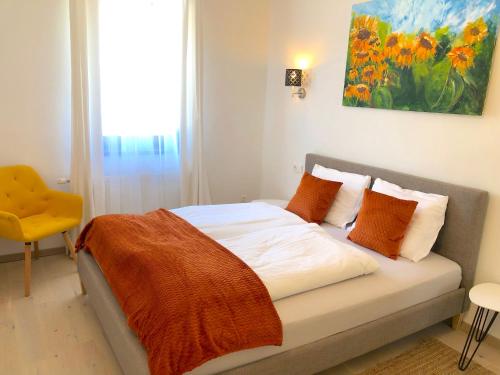 Ένα ή περισσότερα κρεβάτια σε δωμάτιο στο Gästeapartments Rossatz