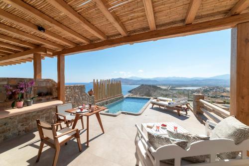 a villa with a view of the ocean at Naxos Rock Villas in Stelida