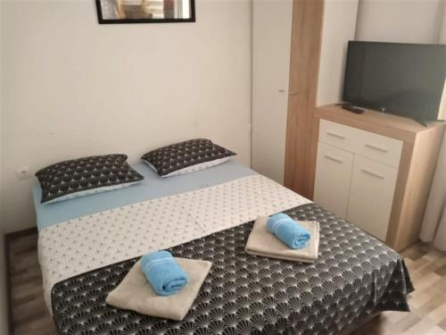Posteľ alebo postele v izbe v ubytovaní Apartment Karlito
