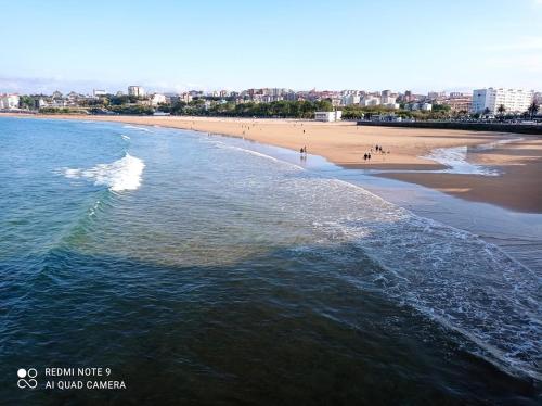 an aerial view of a beach and the ocean at Apto. Las LLamas S20 Santander, Garaje y Wifi in Santander