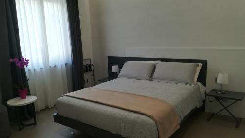 Postel nebo postele na pokoji v ubytování Casa Umeli