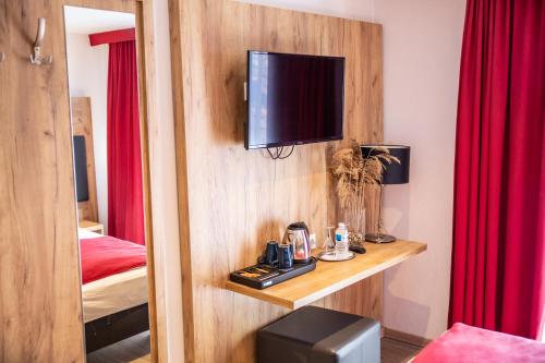 TV a/nebo společenská místnost v ubytování Hotel Am Siebersturm