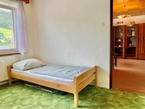Postel nebo postele na pokoji v ubytování Apartmán Bušín