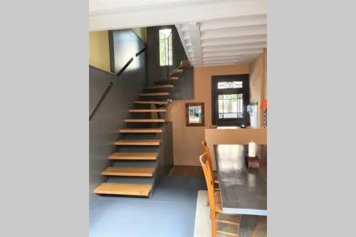 a view of a staircase in a house at Maison exceptionnelle, Campagne a Paris in Paris