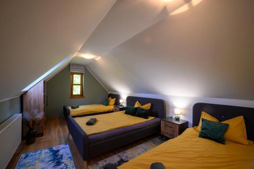 Ein Bett oder Betten in einem Zimmer der Unterkunft Edelin Cottage