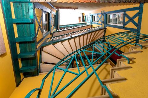 a view of a spiral staircase in a train station at My Sweet Homes - Le 15 in Colmar