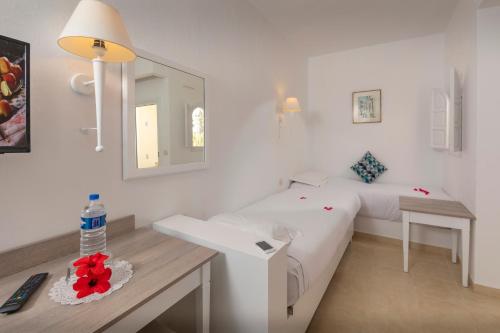 Postel nebo postele na pokoji v ubytování Yadis Djerba Thalasso & Spa - All Inclusive