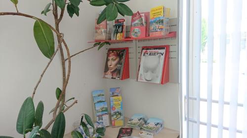 a corner of a room with books on a wall at Pension Elisabeth - Rooms & Apartments in Salzburg
