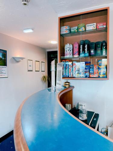 a large blue counter in a dental office at Redwings Lodge Sawtry Huntingdon in Sawtry