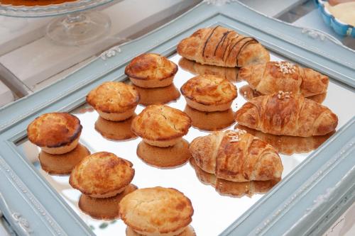 a tray filled with pastries in a refrigerator at B&B Casa di Anita in Arnesano