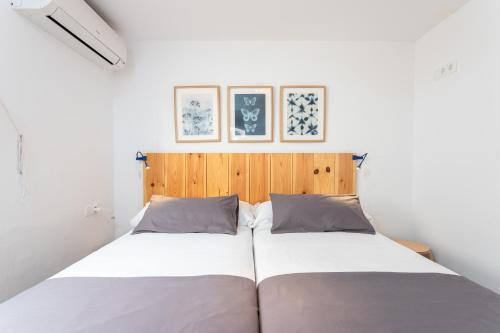 Postel nebo postele na pokoji v ubytování Higuerón Rental Playa Cuesta