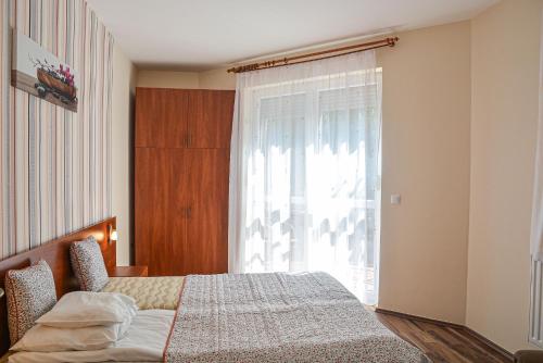 Katil atau katil-katil dalam bilik di Apartman Ottó