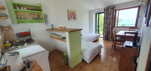 Η κουζίνα ή μικρή κουζίνα στο Boutique Home Saltaragazza