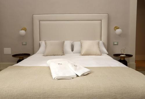 Palazzo Sansonettiにあるベッド