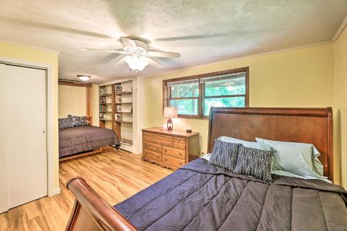 a bedroom with a bed and a ceiling fan at Lovely Richwood Respite Skiing, Biking, Climbing in Richwood