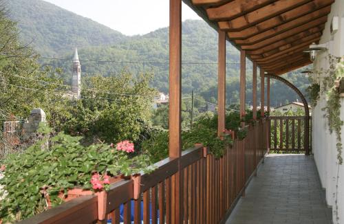 a balcony with a view of a mountain at Borgo di Corte - alloggio agrituristico in Prestento