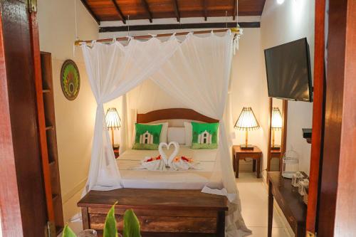 Кровать или кровати в номере Pousada Campestre