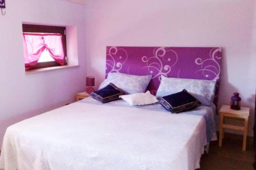 Ένα ή περισσότερα κρεβάτια σε δωμάτιο στο Residenza Flores