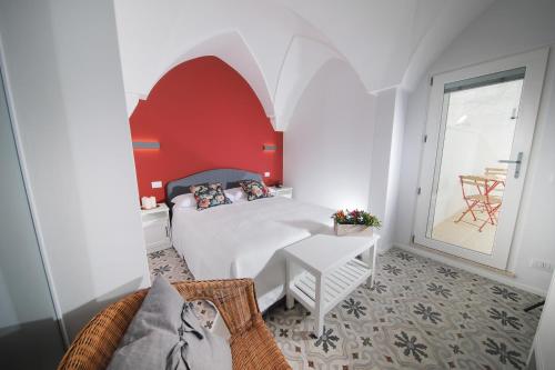 Postel nebo postele na pokoji v ubytování Dimora D'Erchia Apulian Holidays