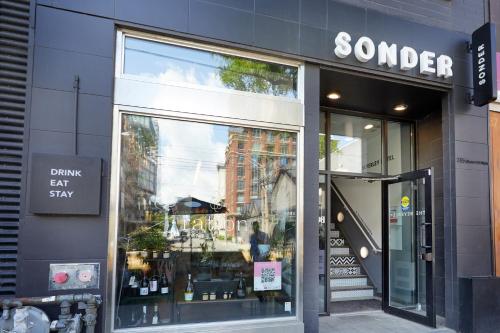 a store front with a large window at Sonder The Beverley in Toronto