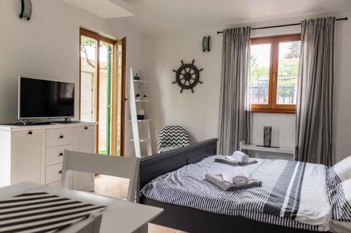 Posteľ alebo postele v izbe v ubytovaní Apartments in Zadar - Zadar Riviera 40411