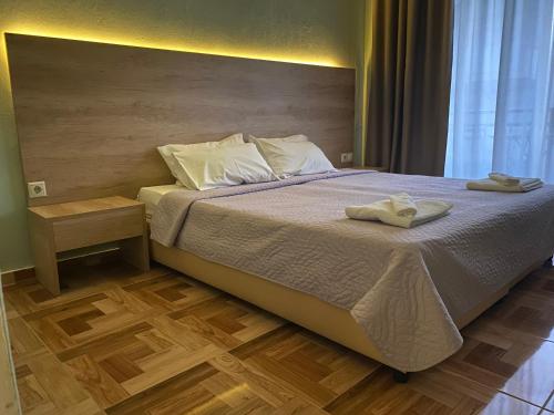 Ένα ή περισσότερα κρεβάτια σε δωμάτιο στο Moudania Mare Hotel