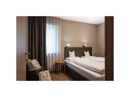 Voodi või voodid majutusasutuse Apartment Sand in Taufers/Südtirol 35188 toas