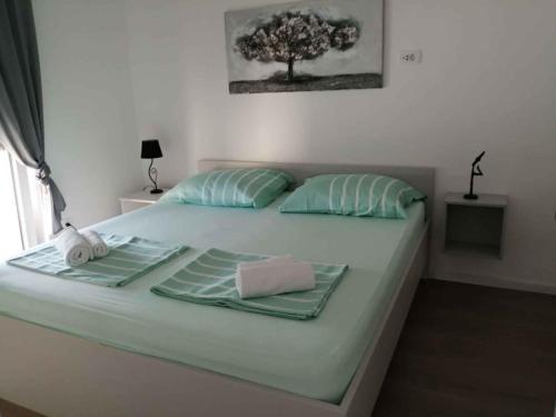 Postel nebo postele na pokoji v ubytování Apartment in Silo/Insel Krk 36991