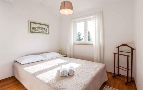 Holiday home in Visnjan/Istrien 34393 tesisinde bir odada yatak veya yataklar