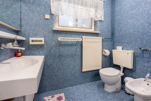 Kúpeľňa v ubytovaní Apartment Aura