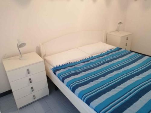 Ένα ή περισσότερα κρεβάτια σε δωμάτιο στο Holiday home in Eraclea Mare 25698