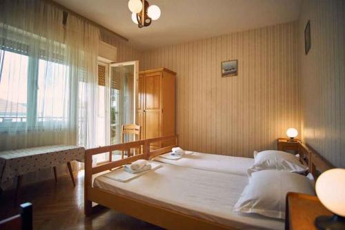 Posteľ alebo postele v izbe v ubytovaní Apartment in Vinisce 7417