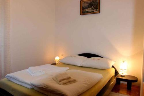 Posteľ alebo postele v izbe v ubytovaní Three-Bedroom Apartment in Novi Vinodolski I