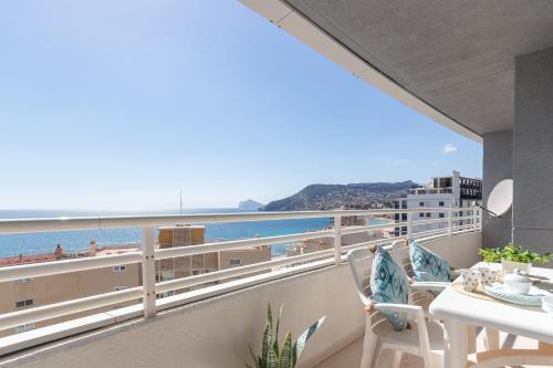 a balcony with a view of the ocean at Apartamento Apolo XIV - Costa CarpeDiem in Calpe