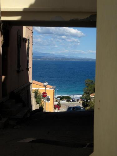 a view of the ocean from a building at Hotel Moderno in Santa Teresa Gallura