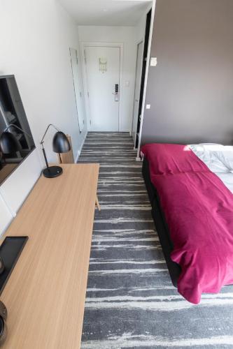 Hotel Koldingにあるベッド
