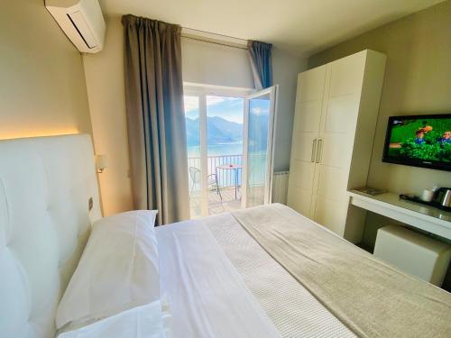 Säng eller sängar i ett rum på Esprit D'Hotel Panoramico