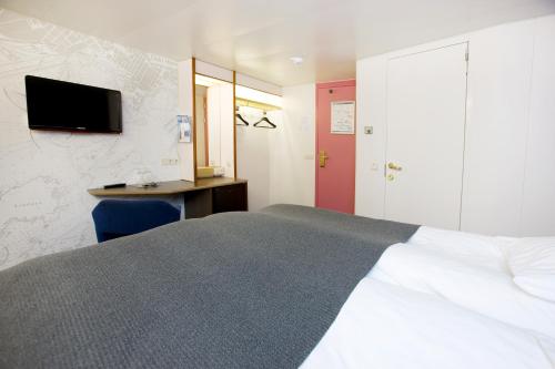 Postel nebo postele na pokoji v ubytování DFDS MiniCruise Oslo - Copenhagen - Oslo