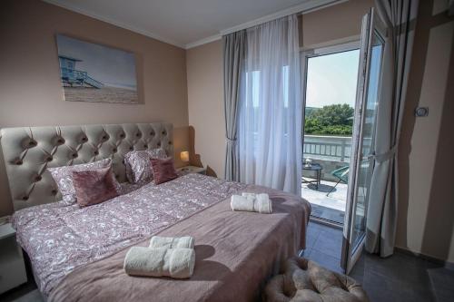Postel nebo postele na pokoji v ubytování Dunavski Cvet