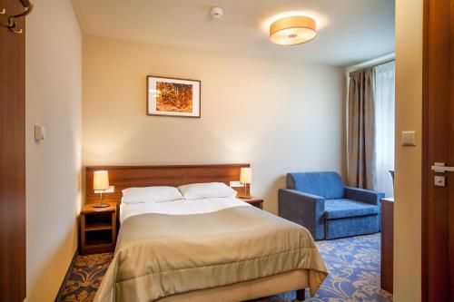 Posteľ alebo postele v izbe v ubytovaní Hotel Miodowy Młyn