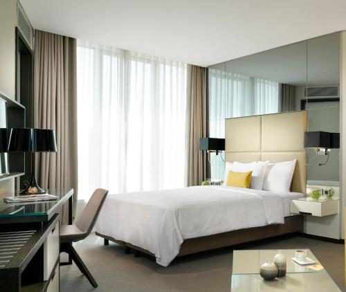 Katil atau katil-katil dalam bilik di Centro Westside by Rotana