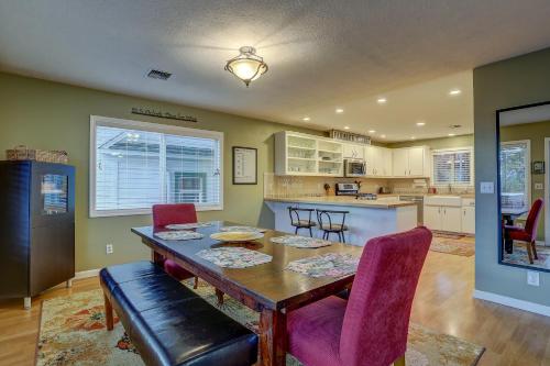 a kitchen and dining room with a table and chairs at Northern Lights home in White Salmon