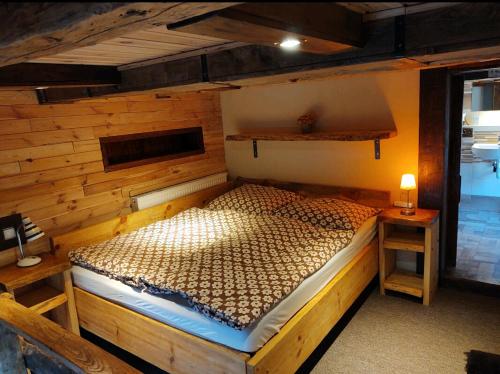 Postel nebo postele na pokoji v ubytování Apartman Tri Duby Tatranská Lomnica