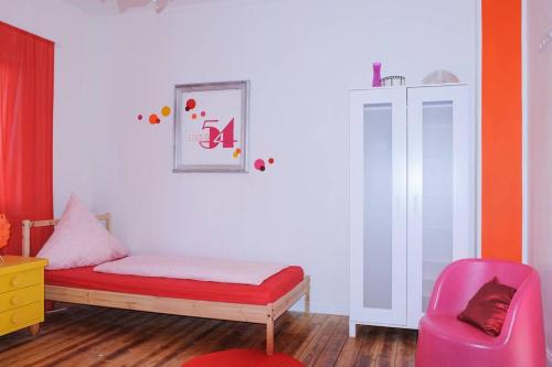 Postel nebo postele na pokoji v ubytování Studio 54