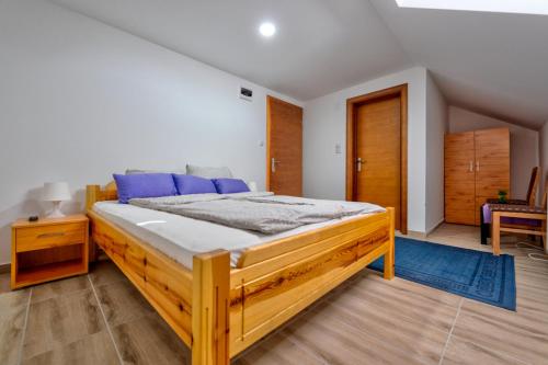 Giường trong phòng chung tại Prenoćište BRAĆA SEKULIĆI