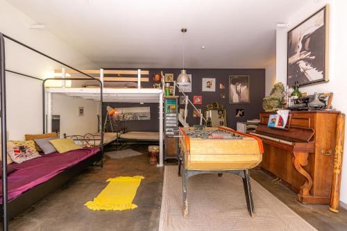 Postel nebo postele na pokoji v ubytování Loft Domloc