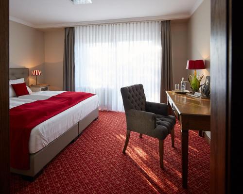 Postel nebo postele na pokoji v ubytování Landhotel & Gasthof Cramer