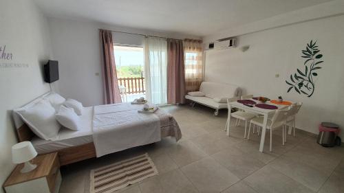 Postel nebo postele na pokoji v ubytování Batkoski Apartments