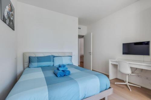 Katil atau katil-katil dalam bilik di Easylife - Modern and Spacious apt in Fiera City Life