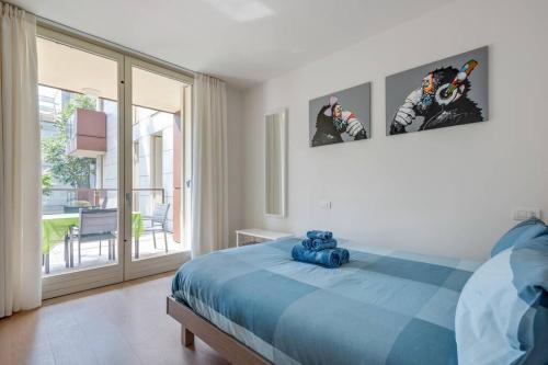 Katil atau katil-katil dalam bilik di Easylife - Modern and Spacious apt in Fiera City Life